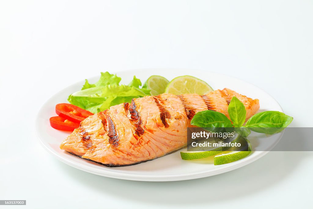 Grilled salmon steak on a plate