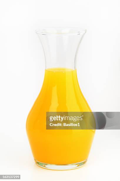 decanter of orange juice - carafe stock pictures, royalty-free photos & images
