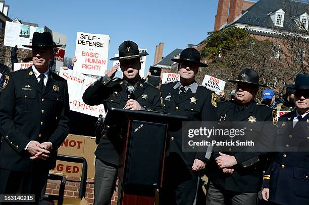 Wicomico County Sheriff Michael A. Lewis and other Maryland sheriffs speak as they and other Second Amendment supporters rally against stricter gun...