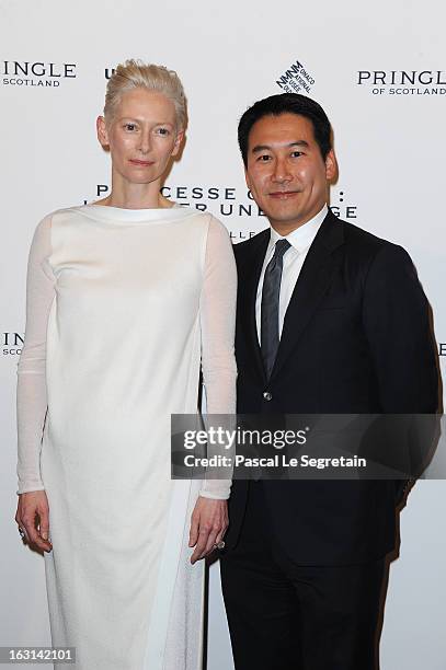 Tilda Swinton and Douglas Fang attend the Pringle Of Scotland Archive Collection Presentation as part of Paris Fashion Week at Salon France-Ameriques...