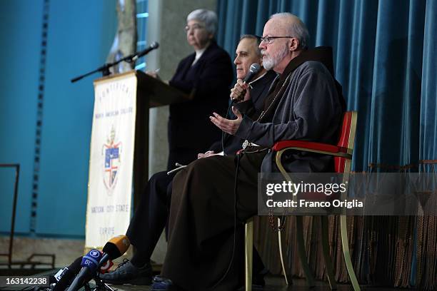 Franciscan archbischop of Boston cardinal Sean O'Malley speaks beside Archbischop of Galveston-Houston cardinal Daniel Di Nardo during a meeting with...