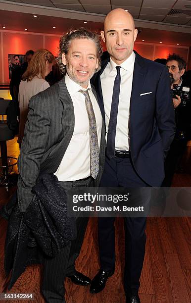 Dexter Fletcher and Mark Strong attend the UK Premiere of 'Welcome To The Punch' at the Vue West End on March 5, 2013 in London, England.