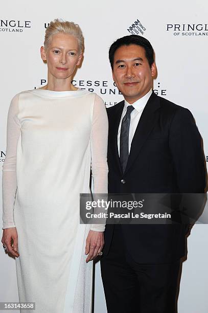 Tilda Swinton and Douglas Fang attend the Pringle Of Scotland Archive Collection Presentation as part of Paris Fashion Week at Salon France-Ameriques...