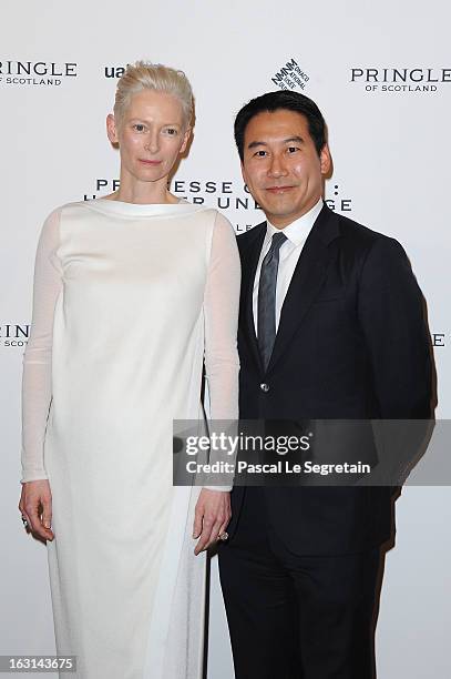 Tilda Swinton and Douglas Fang attend the Pringle Of Scotland Archive Collection Presentation as part of Paris Fashion Week at Salon France-Ameriques...