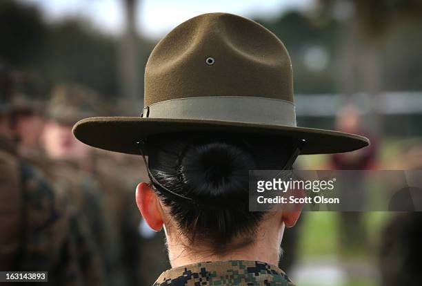 Drill Instructor SSgt. Linda Vansickle from Pensacola, Florida speaks to her female Marine recruits during boot camp February 27, 2013 at MCRD Parris...
