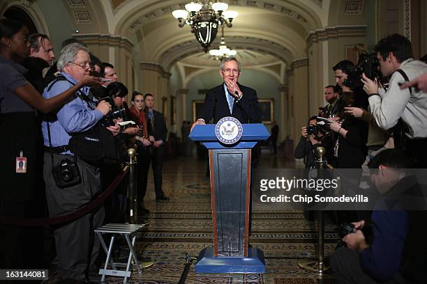 Senate Majority Leader Harry Reid talks to reporters after the weekly Senate Democratic policy committee luncheon at the U.S. Capitol March 5, 2013...