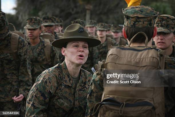 Drill Instructor Sgt. Chasitie Chambers from Bear, Delaware speaks to her female Marine recruits during boot camp February 27, 2013 at MCRD Parris...