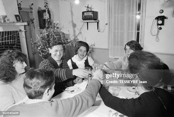 The Survivor Of The Eiffel Tower. En décembre 1964, Christiane COQUENTIN, la rescapée de la Tour Eiffel, en convalescence à CERNAY, passe Noël avec...