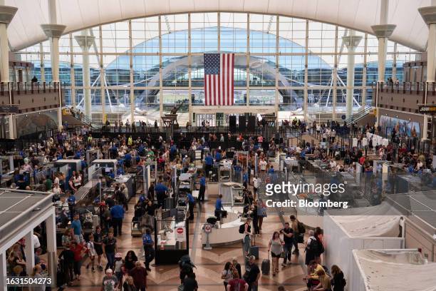 Travelers at a Transportation Security Administration security checkpoint inside the Jeppesen Terminal at Denver International Airport in Denver,...