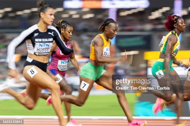 August 21: Sha'Carri Richardson of the United States makes a poor start to the Women's 100m Semi-Final heat two as she trails Shericka Jackson of...