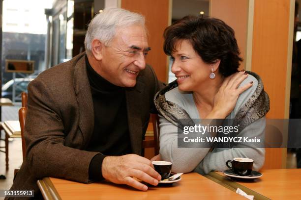 Rendezvous With Dominique Strauss-Kahn In Sarcelles. Plan de trois-quarts de Dominique STRAUSS-KAHN et son épouse Anne SINCLAIR se regardant en se...