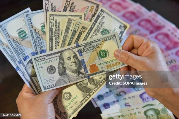 Bonus Rmb Rmb Dollar Photos and Premium High Res Pictures - Getty Images