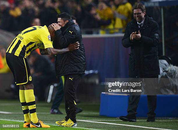 Felipe Santana of Dortmund celebrates with team mate Leonardo Bittencourt after scoring his teams first goal during the UEFA Champions League round...