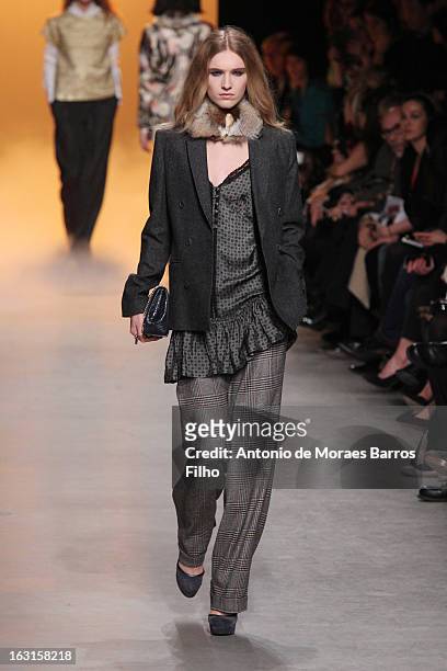 Model walks the runway during the Paul & Jo Fall/Winter 2013 Ready-to-Wear show as part of Paris Fashion Week on March 5, 2013 in Paris, France.