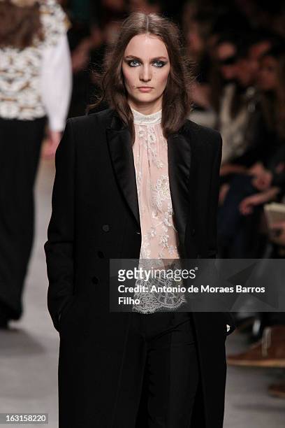 Model walks the runway during the Paul & Jo Fall/Winter 2013 Ready-to-Wear show as part of Paris Fashion Week on March 5, 2013 in Paris, France.