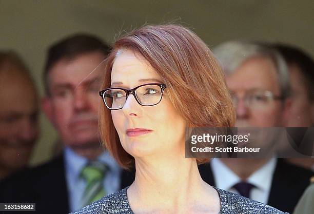Prime Minister of Australia Julia Gillard , former Prime Minister of Australia Kevin Rudd and former Speaker, Peter Slipper look on as they leave the...