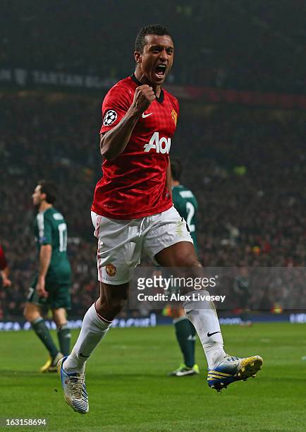 Nani of Manchester United celebrates after Sergio Ramos of Real Madrid scored an own goal during the UEFA Champions League Round of 16 Second leg...