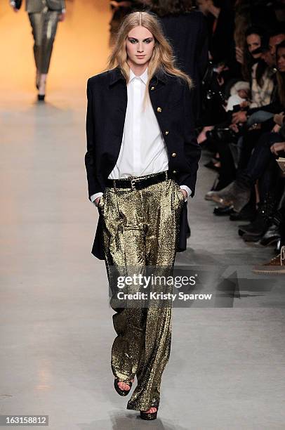 Model walks the runway during the Paul & Joe Fall/Winter 2013/14 Ready-to-Wear show as part of Paris Fashion Week on March 5, 2013 in Paris, France.