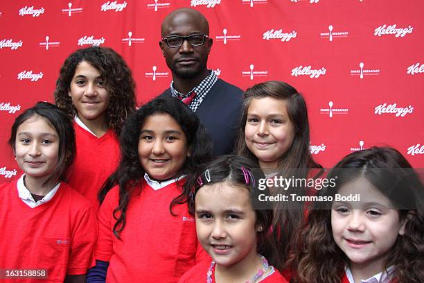 Actor Taye Diggs unveils first-ever milk mustache ad as part of the share breakfast program at Hollywood & Highland Courtyard on March 5, 2013 in...