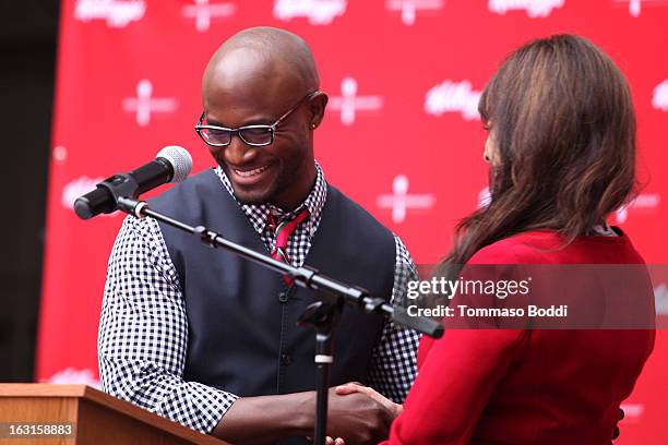 Actor Taye Diggs unveils first-ever milk mustache ad as part of the share breakfast program at Hollywood & Highland Courtyard on March 5, 2013 in...