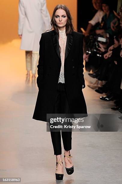 Model walks the runway during the Paul & Joe Fall/Winter 2013/14 Ready-to-Wear show as part of Paris Fashion Week on March 5, 2013 in Paris, France.