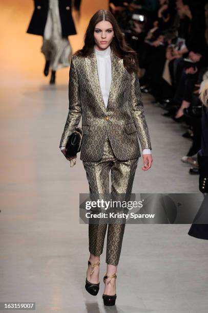 Model walks the runway during the Paul & Joe Fall/Winter 2013/14 Ready-to-Wear show as part of Paris Fashion Week on March 5, 2013 in Paris, France.