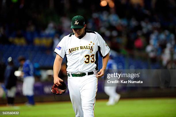 Ryan Searle of Team Australia walks back to dugout at the end of the first inning during Pool B, Game 4 between Team Korea and Team Australia during...