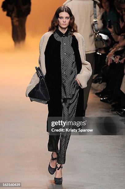 Model walks the runway during the Paul & Joe Fall/Winter 2013/14 Ready-to-Wear show as part of Paris Fashion Week on March 5, 2013 in Paris, France.