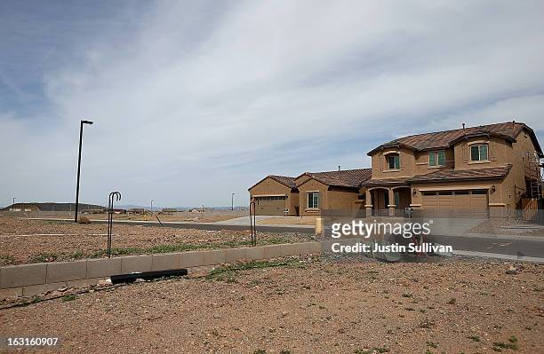 New homes are seen at the Pulte Homes Fireside at Norterra-Skyline housing development on March 5, 2013 in Phoenix, Arizona. In 2008, Phoenix,...