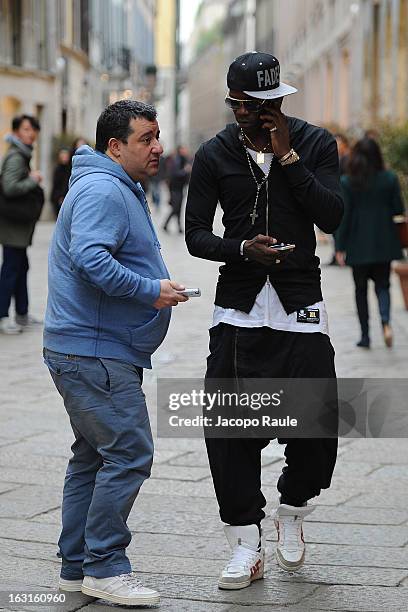 Mino Raiola and Mario Balotelli are seen on March 5, 2013 in Milan, Italy.