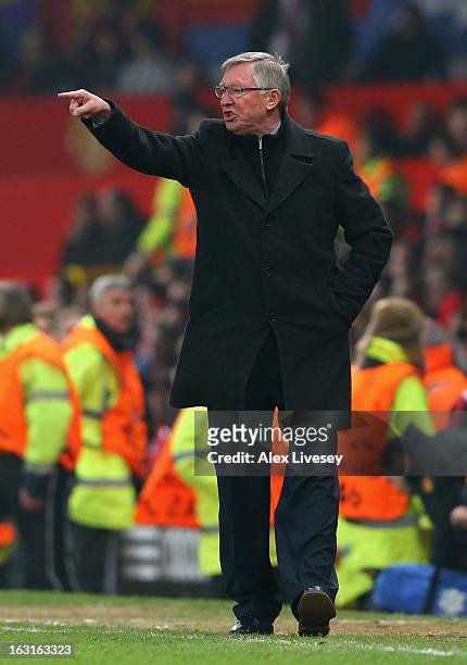 Manchester United Manager Sir Alex Ferguson reacts during the UEFA Champions League Round of 16 Second leg match between Manchester United and Real...