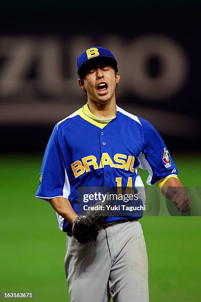 Oscar Nakaoshi of Team Brazil reacts to getting out of a fourth inning jam during Pool A, Game 5 between Team Brazil and Team China during the first...