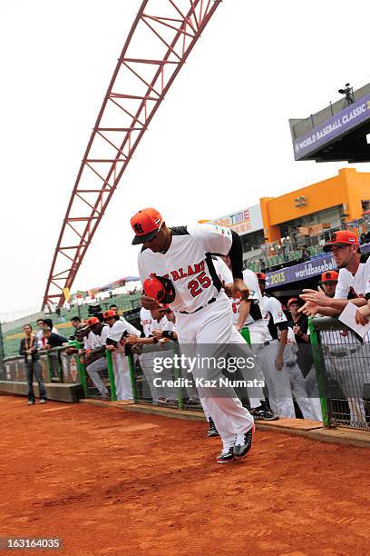 Andruw Jones of Team Netherlands runs out onto the field during player introductions before Pool B, Game 5 between Team Australia and Team...