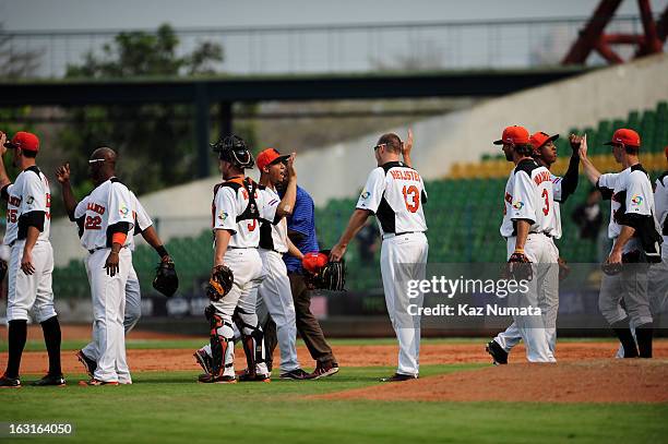 Team Netherlands celebrates defeating Team Australia in Pool B, Game 5 in the first round of the 2013 World Baseball Classic at Taichung...