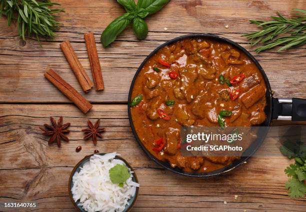 beef curry and basmati rice - pilau rice stock pictures, royalty-free photos & images