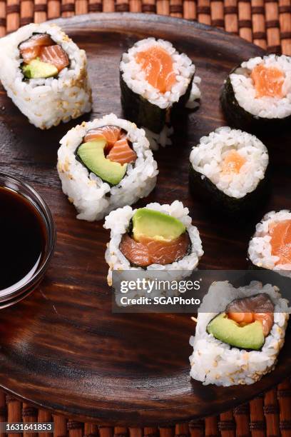salmon and avocado sushi - pilau rice stock pictures, royalty-free photos & images