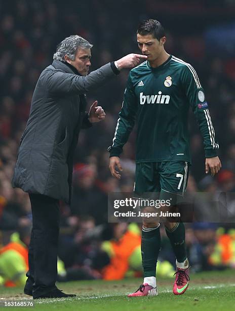 Real Madrid Manager Jose Mourinho gives orders to Cristiano Ronaldo during the UEFA Champions League Round of 16 Second leg match between Manchester...