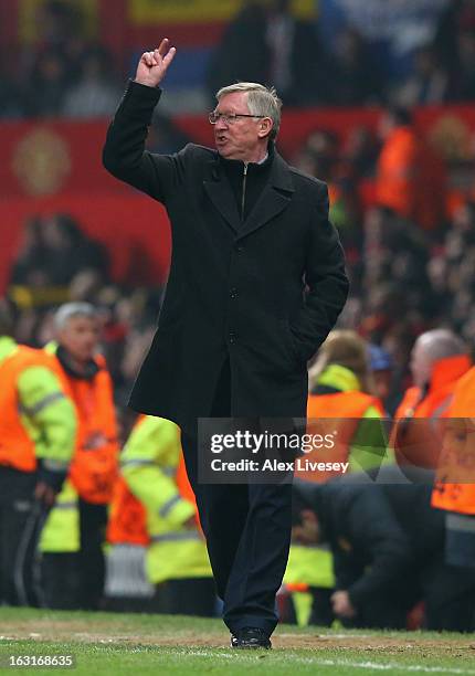 Manchester United Manager Sir Alex Ferguson reacts during the UEFA Champions League Round of 16 Second leg match between Manchester United and Real...