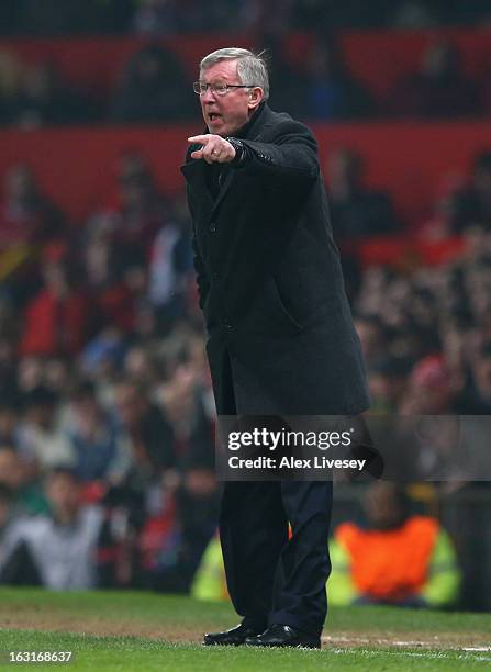 Manchester United Manager Sir Alex Ferguson reacts during the UEFA Champions League Round of 16 Second leg match between Manchester United and Real...