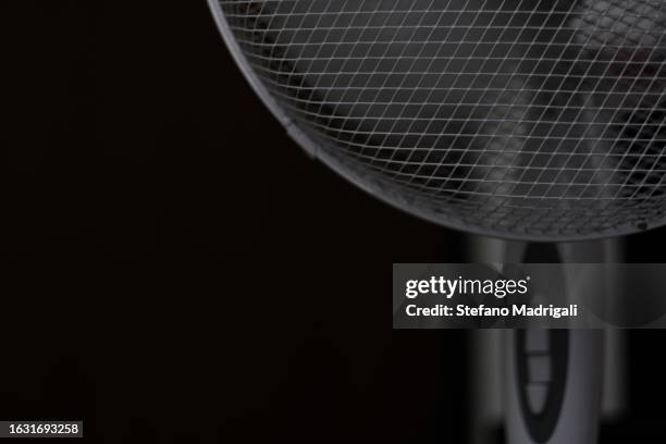 white fan on black background - oggetto creato dall'uomo stock pictures, royalty-free photos & images
