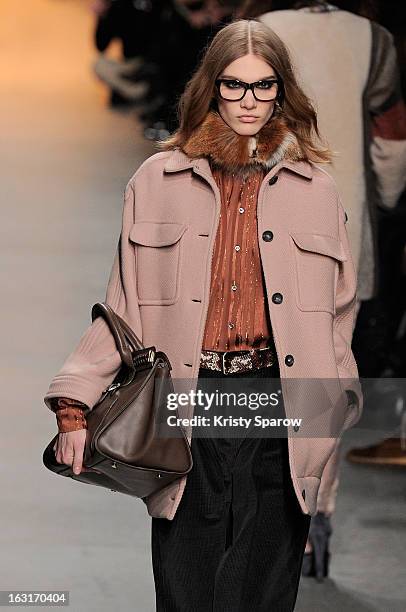 Model walks the runway during the Paul & Joe Fall/Winter 2013/14 Ready-to-Wear show as part of Paris Fashion Week on March 5, 2013 in Paris, France.