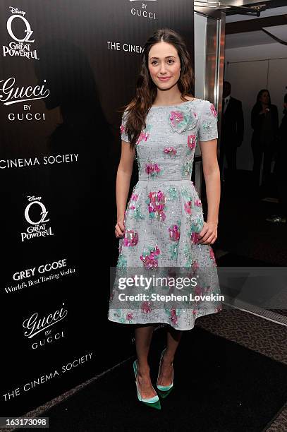 Actress Emmy Rossum attends the Gucci and The Cinema Society screening of "Oz the Great and Powerful" at the DGA Theater on March 5, 2013 in New York...