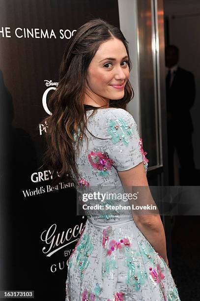 Actress Emmy Rossum attends the Gucci and The Cinema Society screening of "Oz the Great and Powerful" at the DGA Theater on March 5, 2013 in New York...