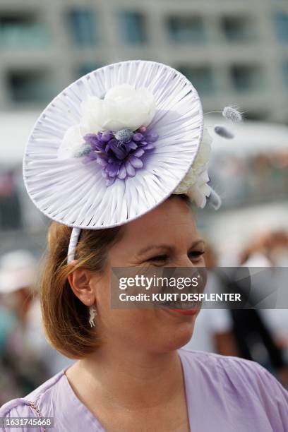 Illustration picture shows spectators wearing spectacular hats at the yearly Waregem Koerse, 'Grote Steeple Chase van Vlaanderen' horse race, at the...