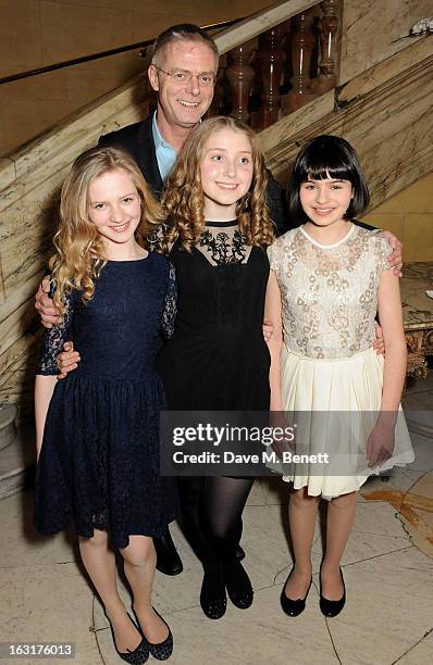 Director Stephen Daldry poses with cast members Nell Williams, Bebe Cave and Maya Gerber attend an after party following the press night performance...