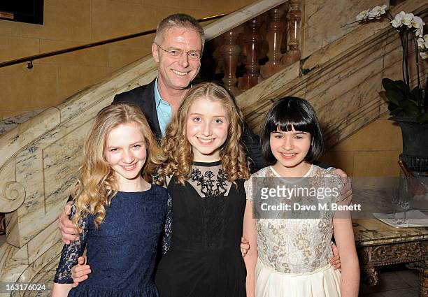Director Stephen Daldry poses with cast members Nell Williams, Bebe Cave and Maya Gerber attend an after party following the press night performance...