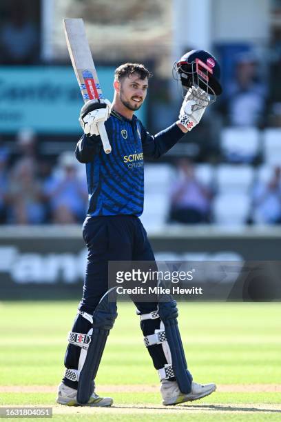 Ed Barnard of Warwickshire celebrates after reaching his century during the Metro Bank One Day Cup match between Sussex Sharks and Warwickshire at...