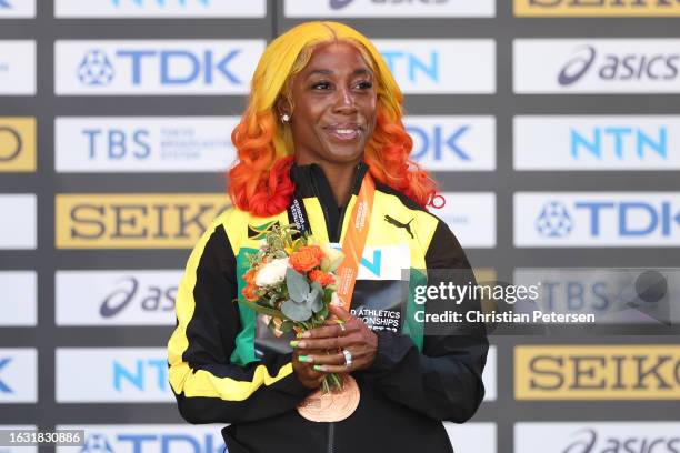 Bronze medalist Shelly-Ann Fraser-Pryce of Team Jamaica poses for a photo during the medal ceremony for the Women's 100m during day four of the World...