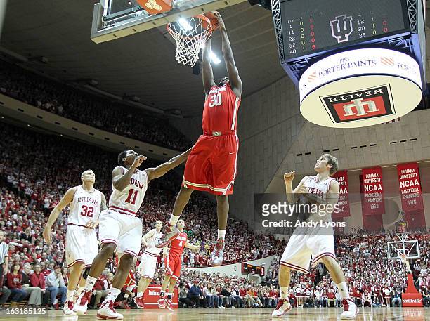 Evan Ravenel of the Ohio State Buckeyes shoots the ball during the game against the Indiana Hoosiers at Assembly Hall on March 5, 2013 in...