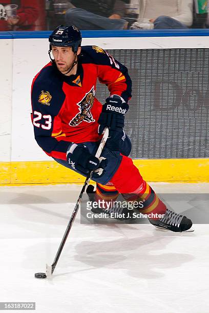 Tyson Strachan of the Florida Panthers skates with the puck against the Carolina Hurricanes at the BB&T Center on March 3, 2013 in Sunrise, Florida.